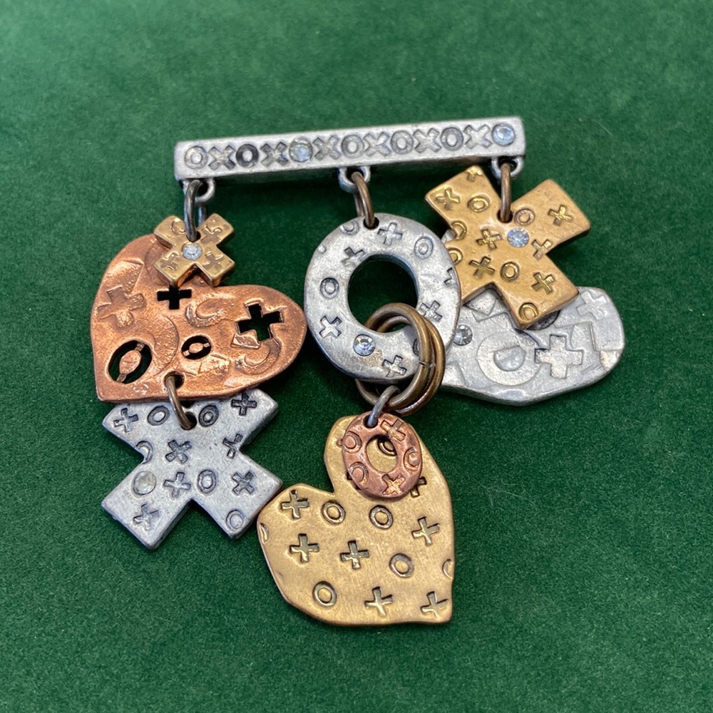 Chico’s xoxo embellished pin.